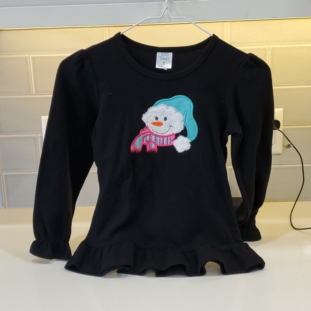 Snowman appliqué girl